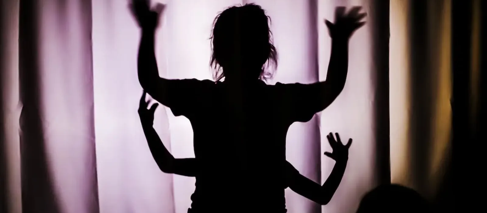 Children’s silhouette. The concept of child protection. Children’s performance in the theater. Children's silhouette. The concept of child protection. Children's performance in the theater.
